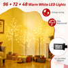 Lighted birch tree set of 3 with warm white LED lights, featuring 4, 5, and 6 ft heights for indoor and outdoor holiday.