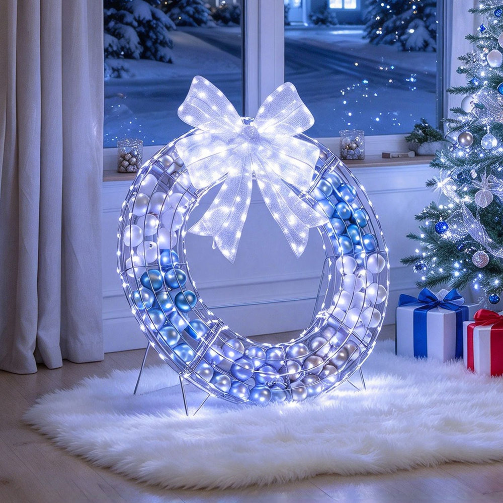 Lighted Christmas wreath decoration features 332 LED lights and 88 colorful balls, perfect for festive holiday cheer.