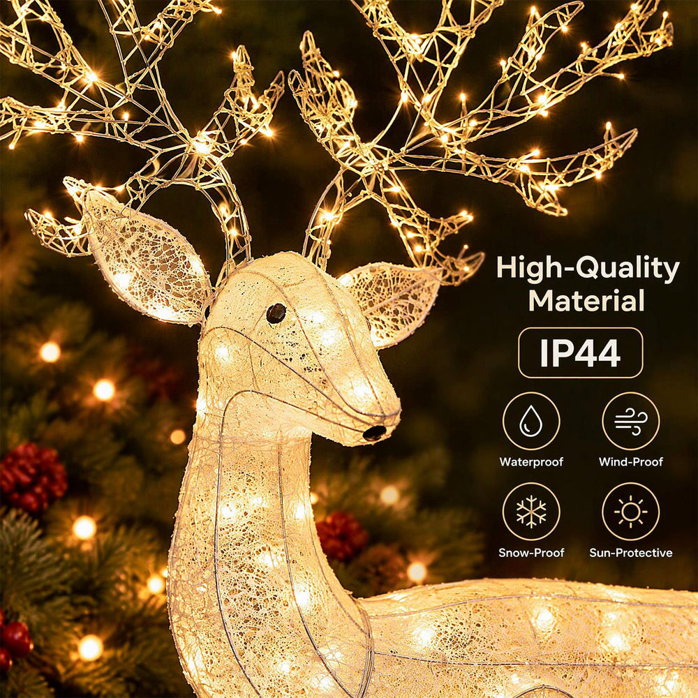 Lighted kneeling Christmas reindeer with 280 warm white LED lights, waterproof and sun-protective for festive outdoor decor.