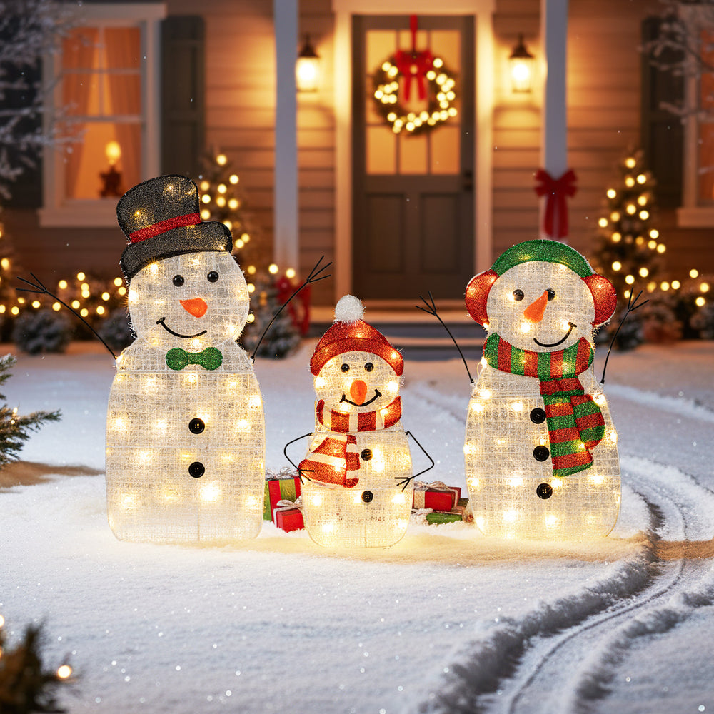 Lighted snowman family decoration set featuring a dad, mom, and baby with 95 warm-white LED lights for festive outdoor.