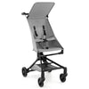 Lightweight gray baby stroller with adjustable canopy, compact fold, and safety harness, ideal for travel and easy use.