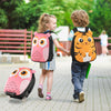 Children walking with a pink owl rolling suitcase and an orange tiger backpack, designed for ages 3-8 years.