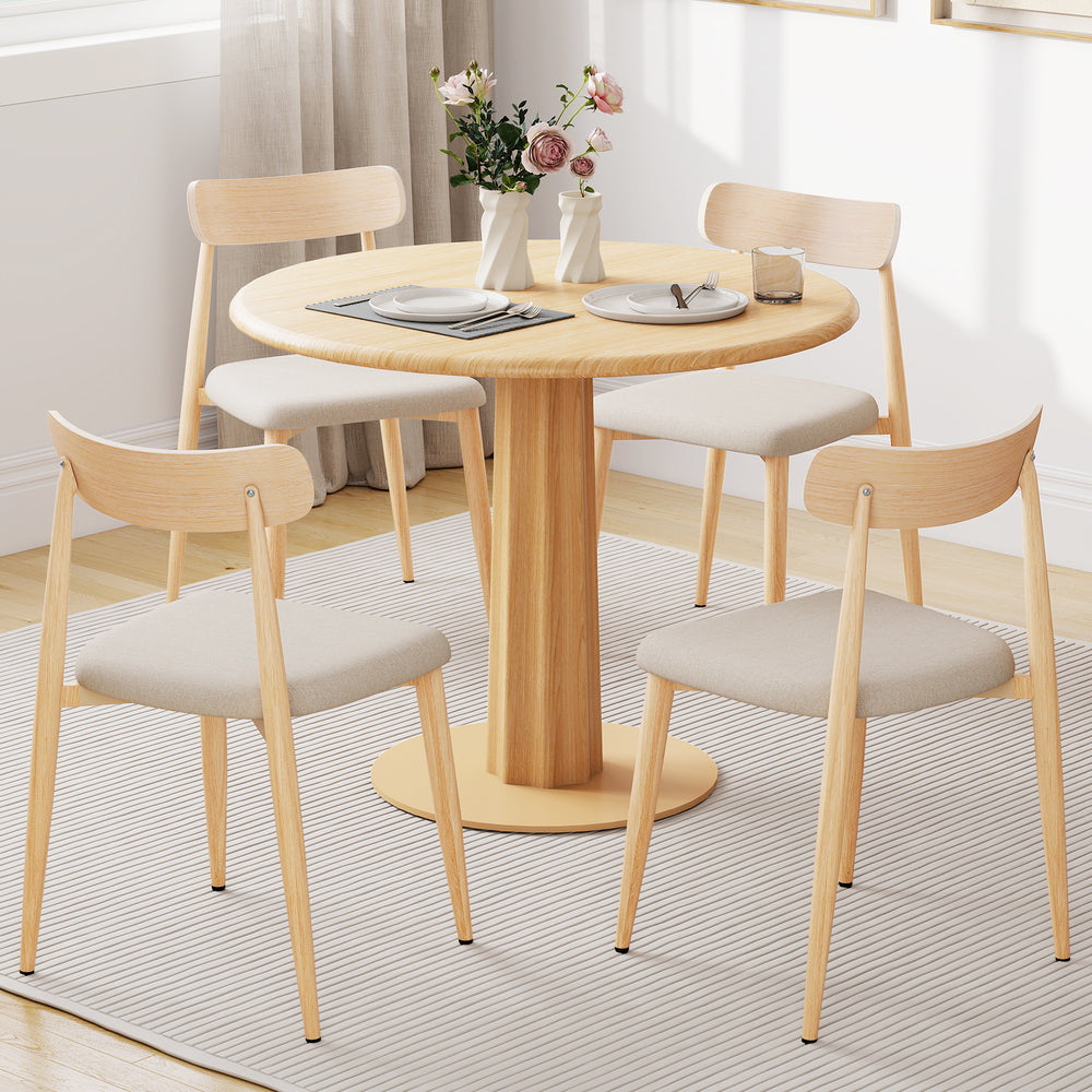 Modern dining chair set of 4 with padded seats and curved backs, featuring oak legs, ideal for dining rooms and cafes.