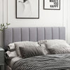 Gray linen upholstered headboard with vertical tufting, suitable for full and queen size beds, enhancing modern bedroom.