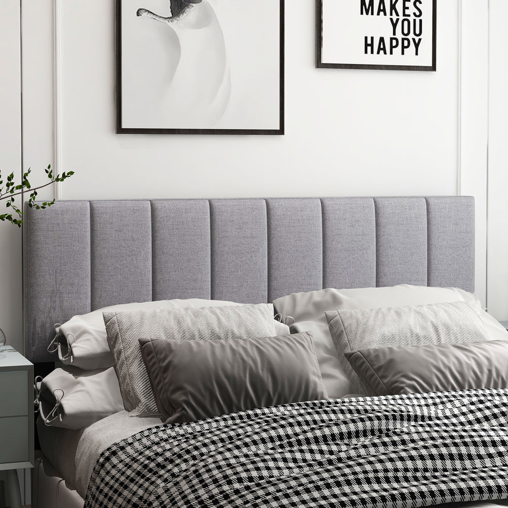 Gray linen upholstered headboard with vertical tufting, suitable for full and queen size beds, enhancing modern bedroom.