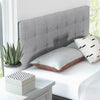 Gray linen upholstered headboard with button tufting and rubber wood legs, perfect for full/queen size beds.
