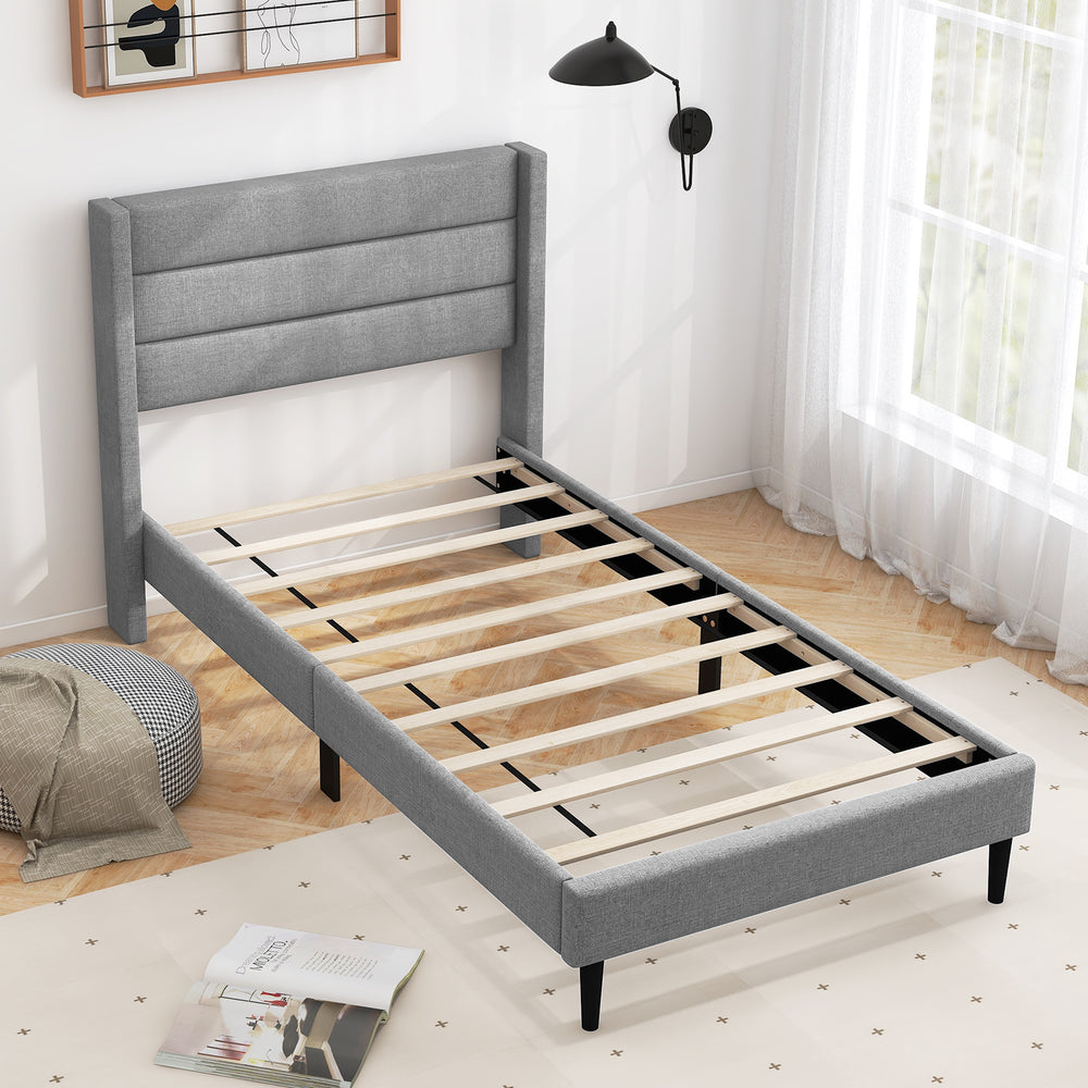 Twin size bed frame with a wingback headboard in breathable linen, showcasing elegant quilting and strong center.