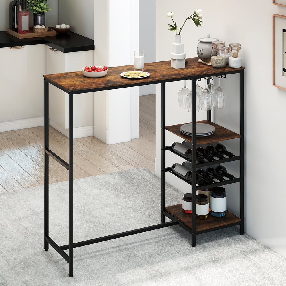 Rustic brown bar height dining table with storage shelves, stemware holders, and wine racks for versatile use.