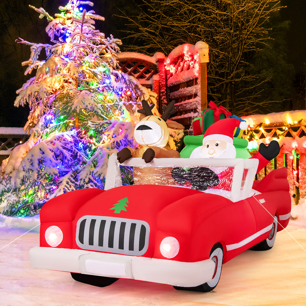 Inflatable Santa Claus and reindeer in a red car with gift bag, featuring 9 LED lights for festive outdoor display.