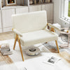 Beige loveseat sofa with armrests and wooden legs, featuring soft sherpa fabric, ideal for small spaces and relaxation.