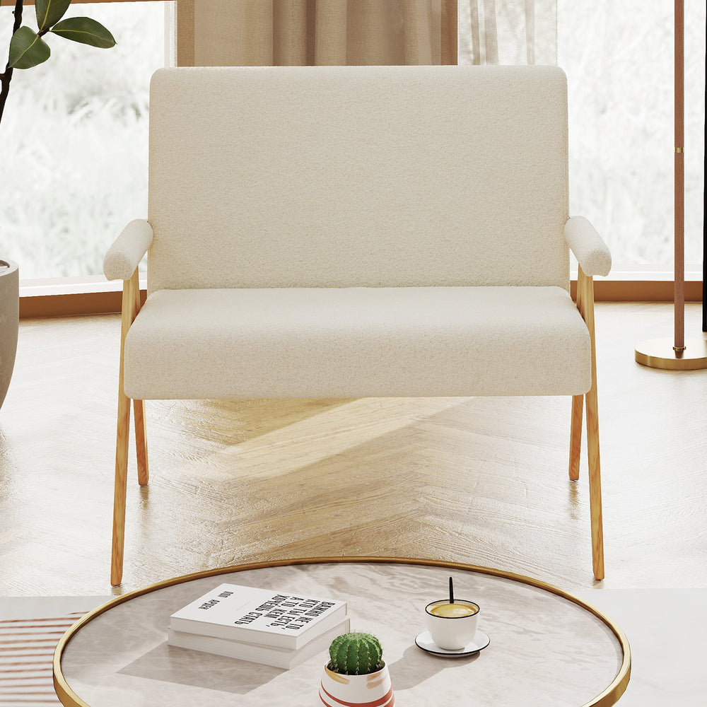 Beige loveseat sofa with upholstered armrests and wooden legs, designed for comfort in small spaces.