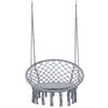 Macrame swing chair hammock in grey with round seat cushion and decorative fringes, ideal for indoor and outdoor use.