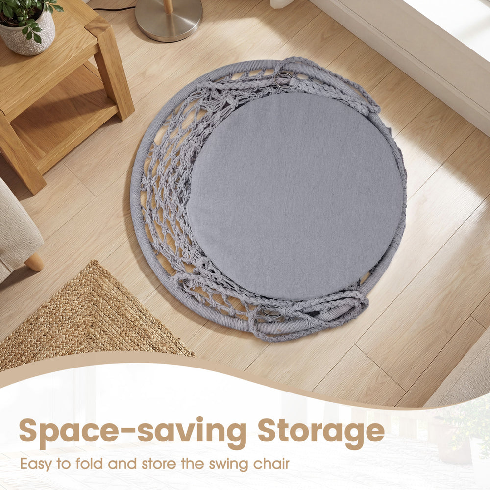 Macrame swing chair with round grey seat cushion, featuring space-saving storage and bohemian style for indoor or.