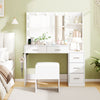 Makeup table and stool set in white with HD mirror, adjustable lighting, hair dryer stand, and ample storage for.