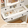 Makeup vanity desk featuring a transparent glass tabletop and organized storage for easy access to beauty items.