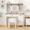Makeup vanity desk with a sleek white finish, adjustable shelves, and a glass tabletop for stylish beauty storage and.