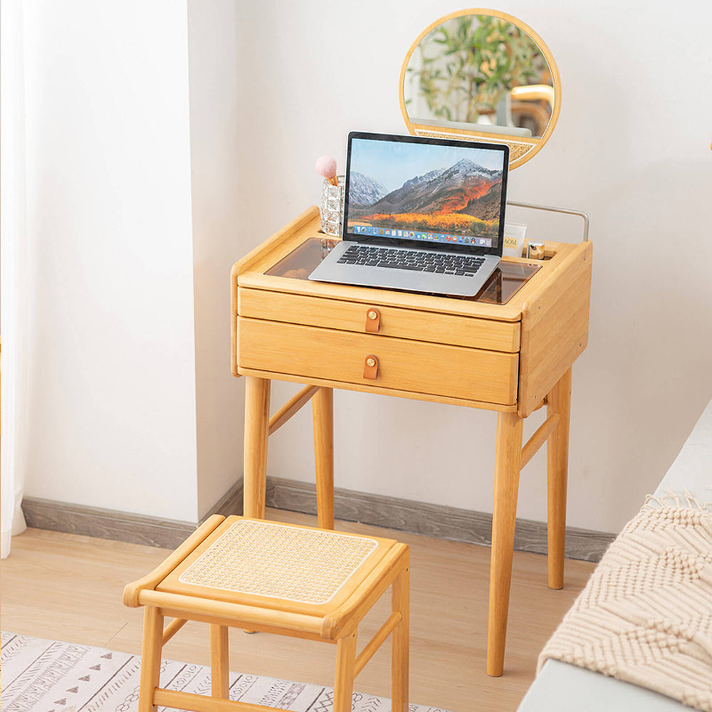 Bamboo makeup vanity table with rotating mirror, two drawers, and a breathable faux rattan stool for organized.