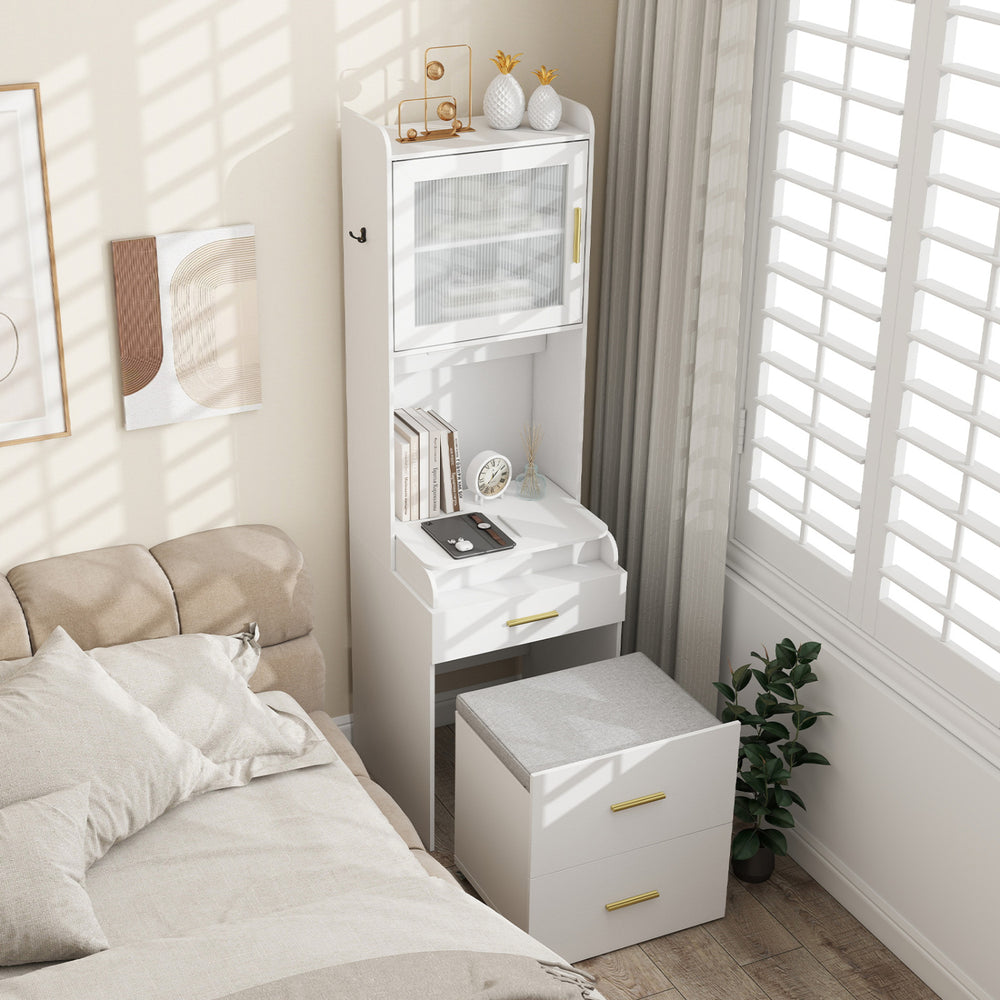 Makeup vanity with flip-top mirror, storage stool, and power outlets in white, perfect for bedroom organization.