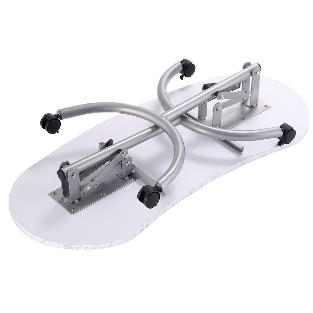Foldable portable manicure nail table in white with sturdy metal legs and lockable wheels for easy mobility and storage.