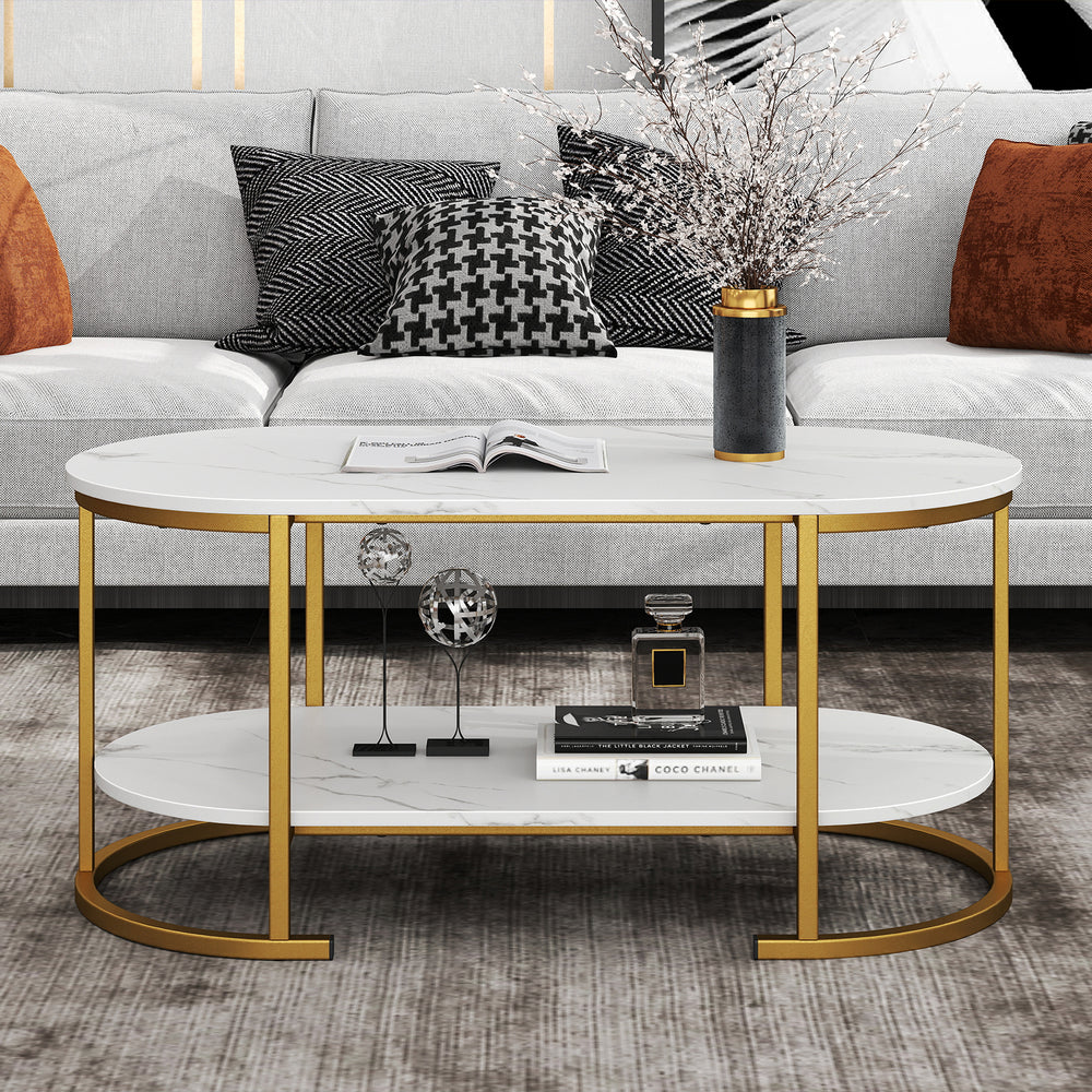 Oval marble coffee table showcasing a white faux marble finish and gold metal frame, perfect for stylish living room.