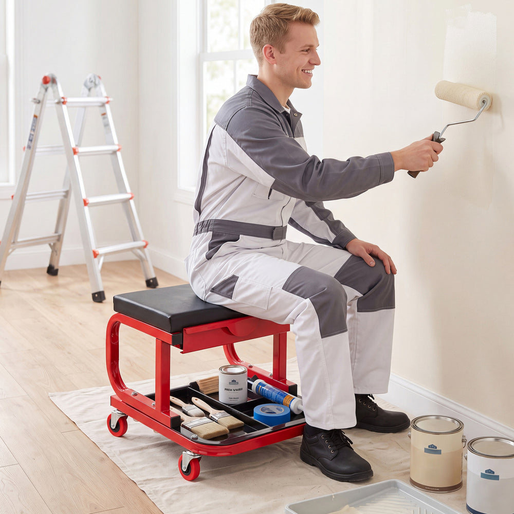 Mechanic rolling stool in red with tool trays and magnetic drawer, ideal for garage and DIY projects.