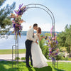 Metal garden arch backdrop stand with elegant design, perfect for weddings and climbing plants, set against a scenic.