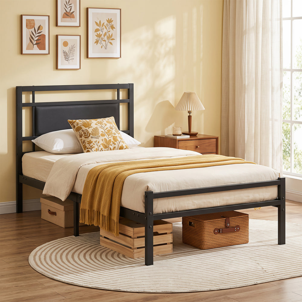 Twin size metal bed frame with upholstered headboard and middle metal legs for added support and a modern bedroom look.