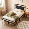 Twin size metal bed frame with upholstered headboard, featuring sturdy slats and ample under-bed storage for organization.