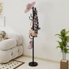 Stylish metal coat rack stand showcasing a hat and bags, designed for efficient space-saving in modern entryways.