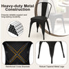 Black metal dining chair with removable back, cushioned seat, and stackable design for versatile use in dining or cafes.