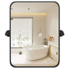 Black metal framed pivot rectangle wall-mounted mirror in a bright bathroom setting, perfect for modern decor.