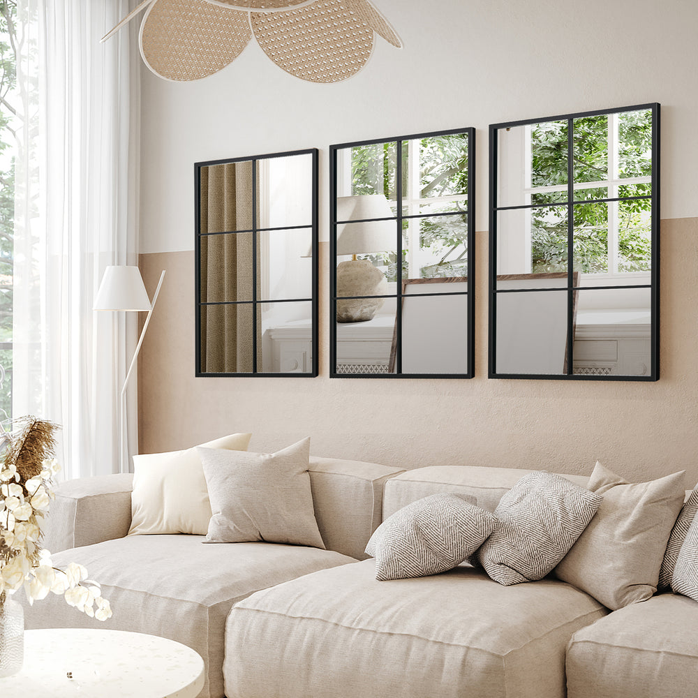 Three-layered black decorative wall mirror with metal frame, ideal for enhancing living room decor and saving space.