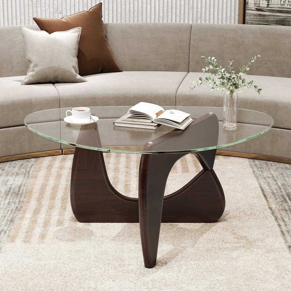 Triangle coffee table with a stylish tempered glass top and walnut rubber wood base, perfect for magazines and drinks.
