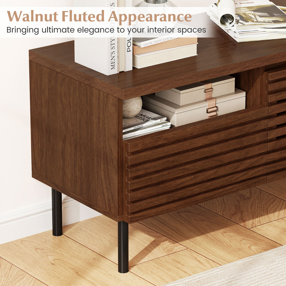 Mid Century Fluted TV stand in walnut finish with open compartment and drawer, perfect for modern entertainment setups.
