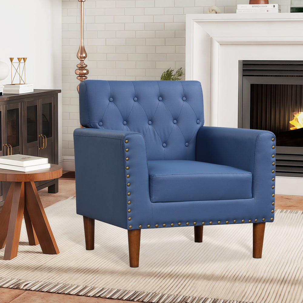 Mid Century Modern accent chair in blue with button tufting and rivets, featuring rubber wood legs for sturdy support.