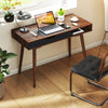 Mid-century modern computer desk in brown with drawer and open compartment, ideal for working and studying.