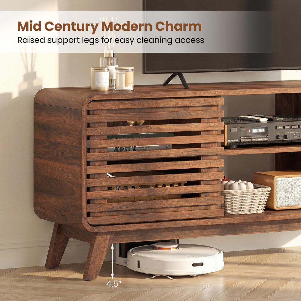 Mid Century Modern Entertainment Center in walnut finish with grille-style sliding doors and raised support legs for.