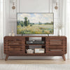 Mid Century Modern entertainment center in walnut showcasing grille-style sliding doors and a spacious top for decor.
