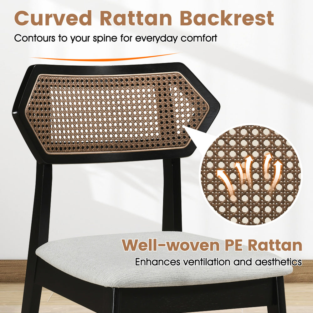 Curved rattan backrest of the Mid Century dining chair set enhances comfort and ventilation for relaxed seating.