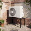 Adjustable black ground stand for mini split air conditioners, elevating units for stability and protection from.