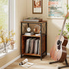 Mobile record player stand in rustic brown with open shelves, dividers, and power outlet for vinyl records and media.