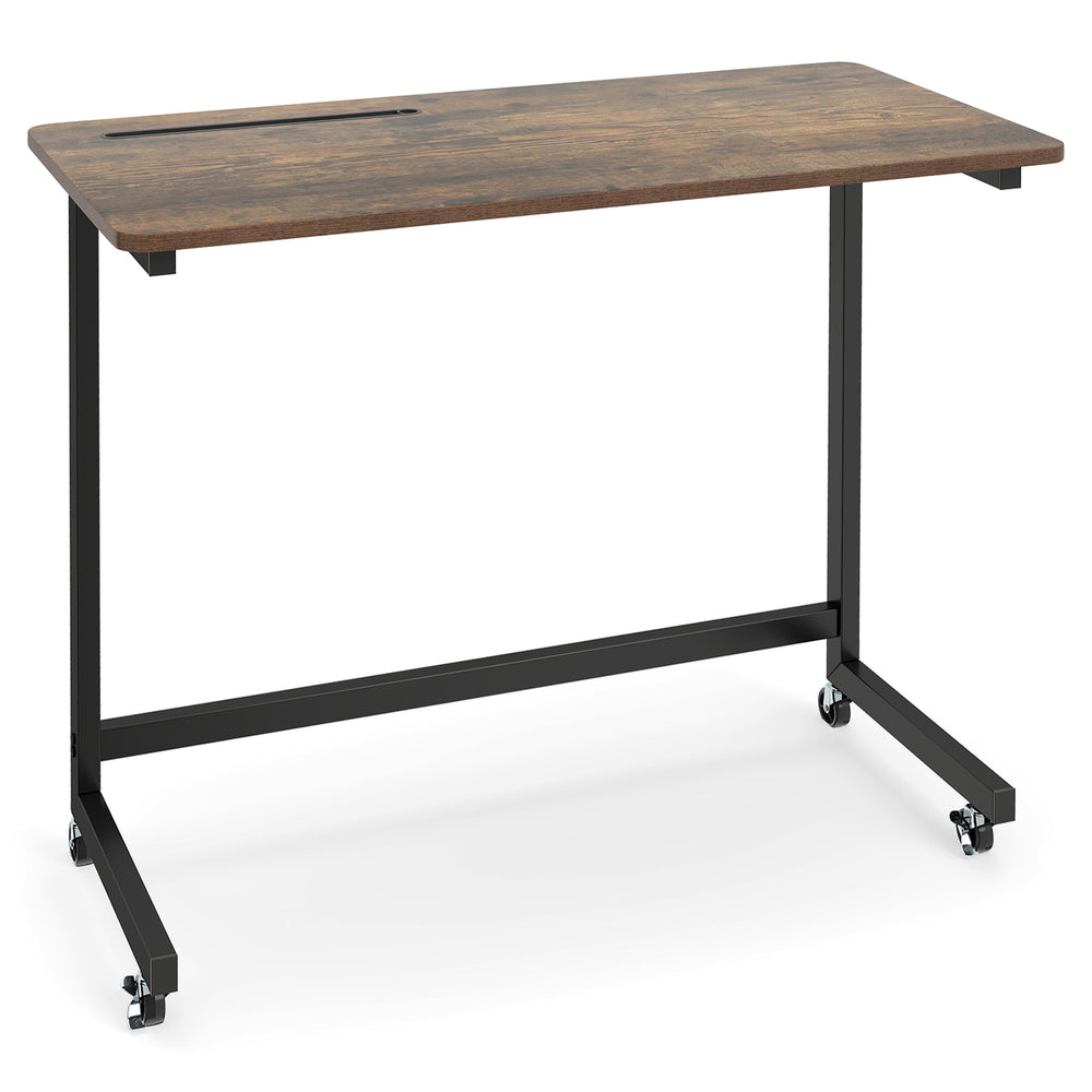 Mobile side table with rustic brown tabletop and black metal frame, featuring a tablet slot and rolling wheels for easy.