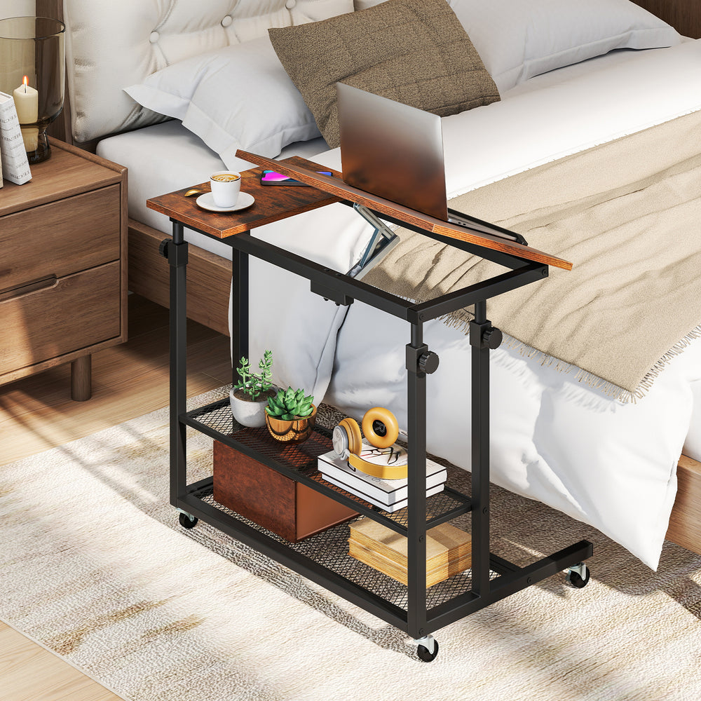 Height adjustable mobile stand-up desk with tilting tabletop in rustic brown, ideal for home office or bedroom use.