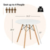 Round dining table with solid beech wood legs, seats up to 4 people, ideal for small spaces like apartments or kitchens.
