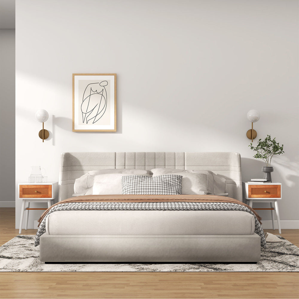 Modern bedside table with solid wood legs and rattan front panel, perfect for bedroom or living room storage.