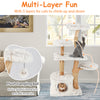 Modern cat tree with plush coverings, natural wood branches, and a dangling ball for playful interaction and climbing.