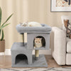 Modern gray cat tree featuring two condos and an upholstered perch, ideal for small spaces and feline relaxation.