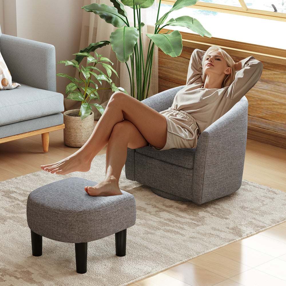 Modern grey club swivel accent chair with ottoman footrest, featuring a curved backrest for ergonomic support.