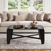 Rectangular black coffee table with rubber wood cross-leg base, designed for stability and enhanced safety with rounded edges.