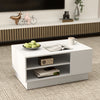Modern coffee table in white showcasing open storage shelves and a stylish recessed base for contemporary living spaces.